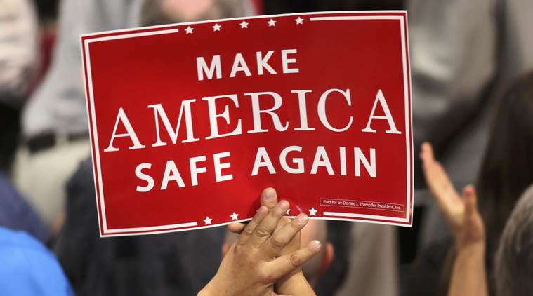 A delegate holds a sign during speeches at the Republican National Convention in Cleveland, Ohio